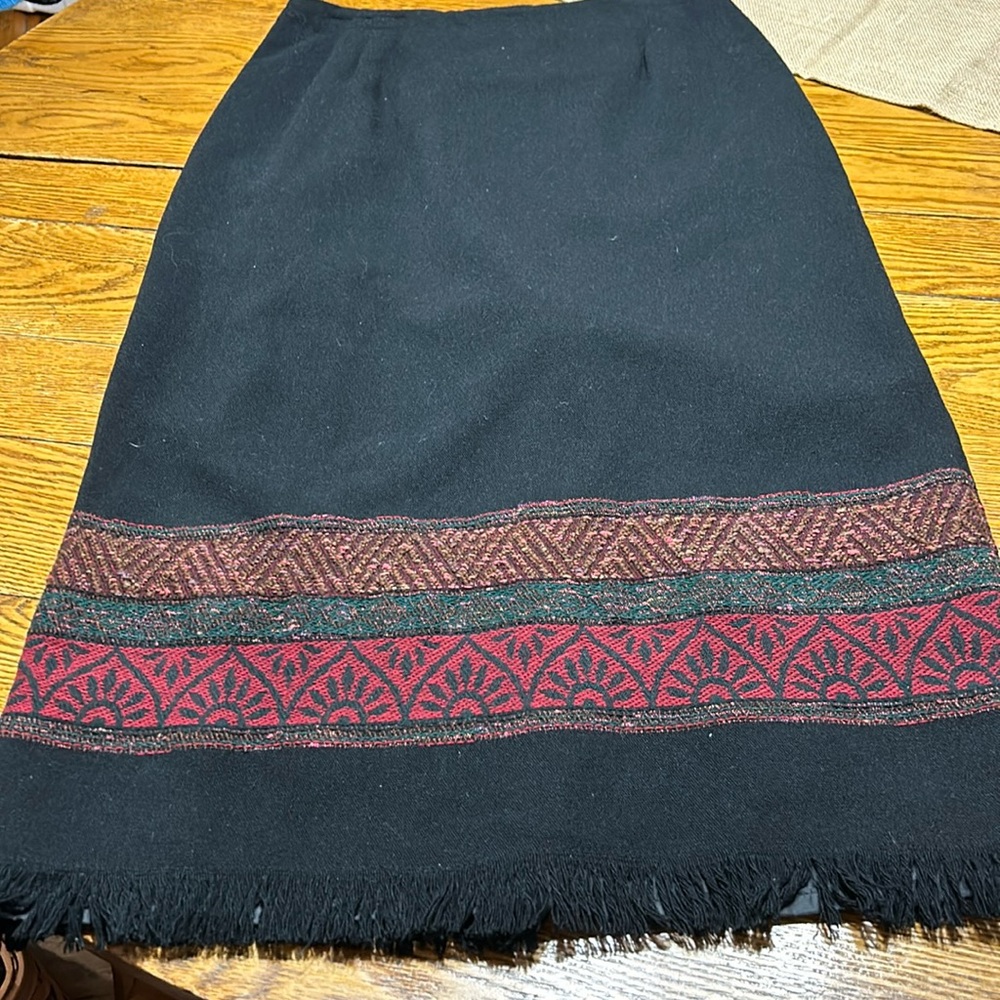 Michele black fringe skirt. Acrylic/wool blend. Back zipper. Size 14. Lined.